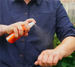 Wearing-long-sleeves-and-insect-repellent-outdoors